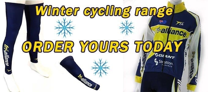 Winter cycling gear including jacket, tights, and arm warmer with blue and yellow branding