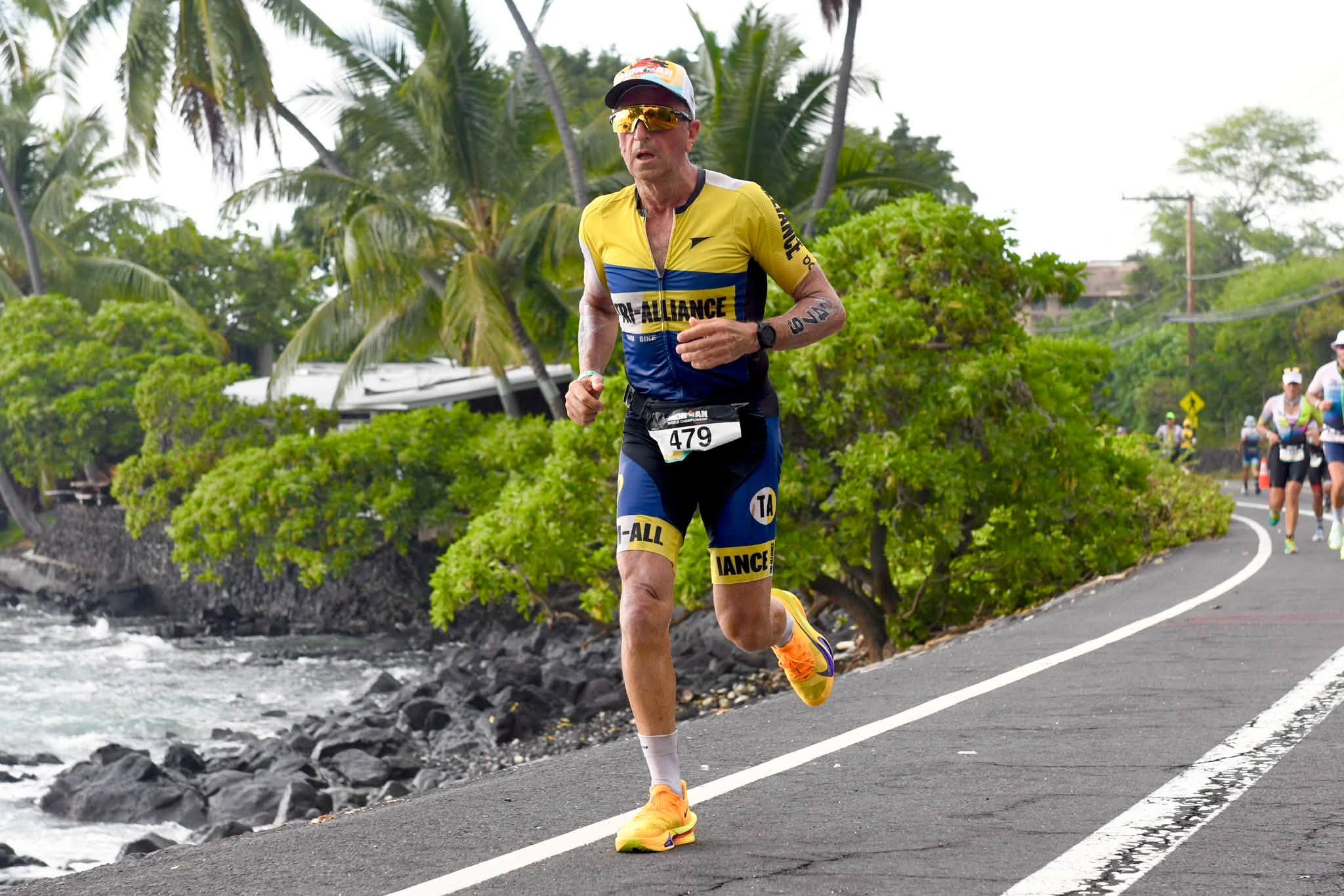 Mario Staffieri running along the coast on the Kona marathon course